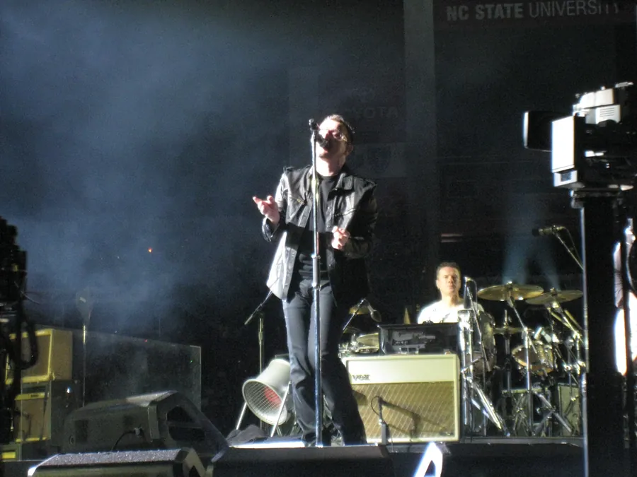 Bono of U2 performing live
